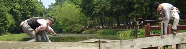 Photo of lock keepers tending lock 20